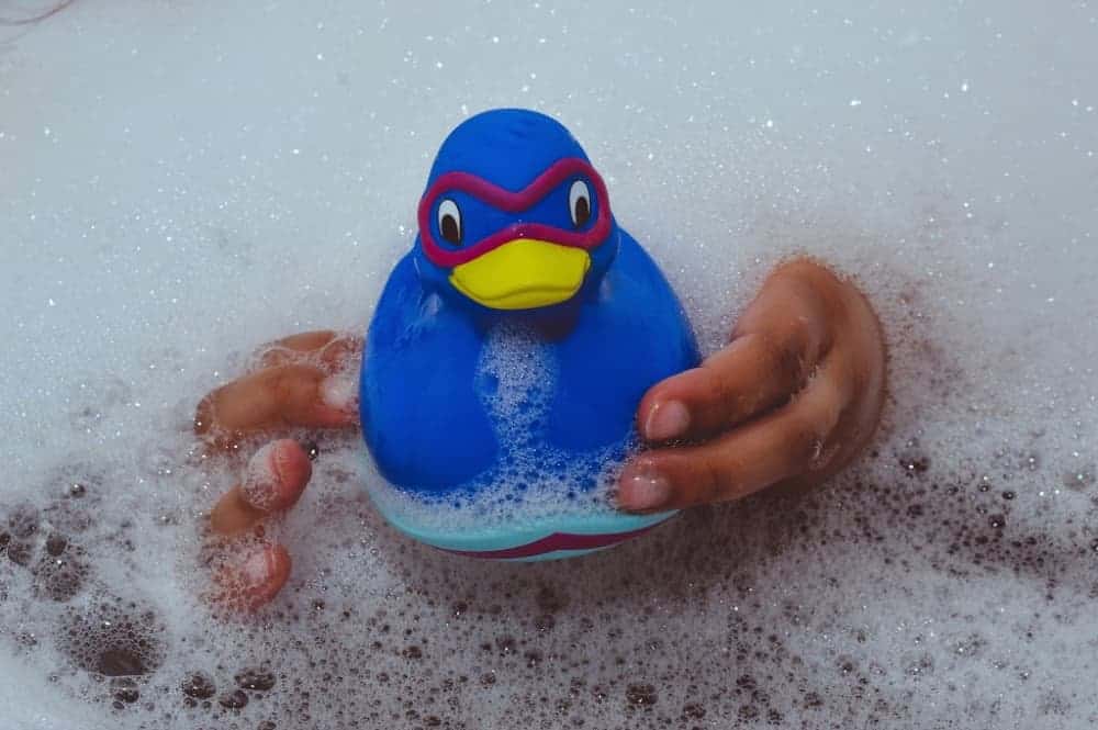 blue-rubber-ducky-in-bubble-bath
