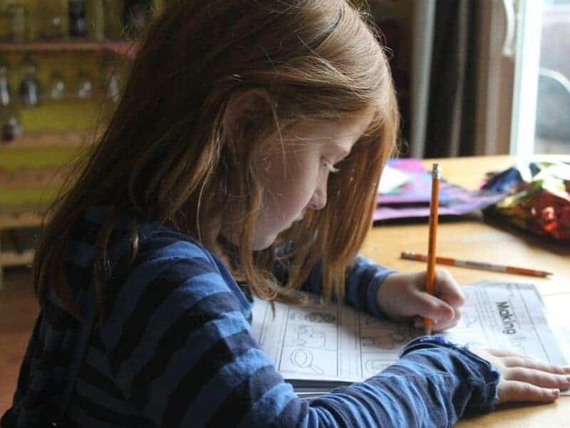 girl-doing-homework-ehlp-child-succeed