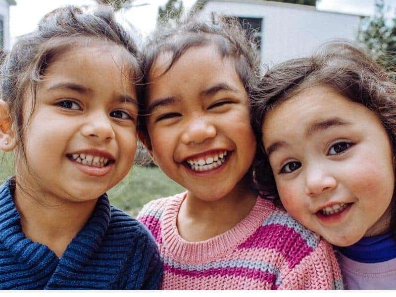 three-smiling-girls-solve-conflicts-with-peers