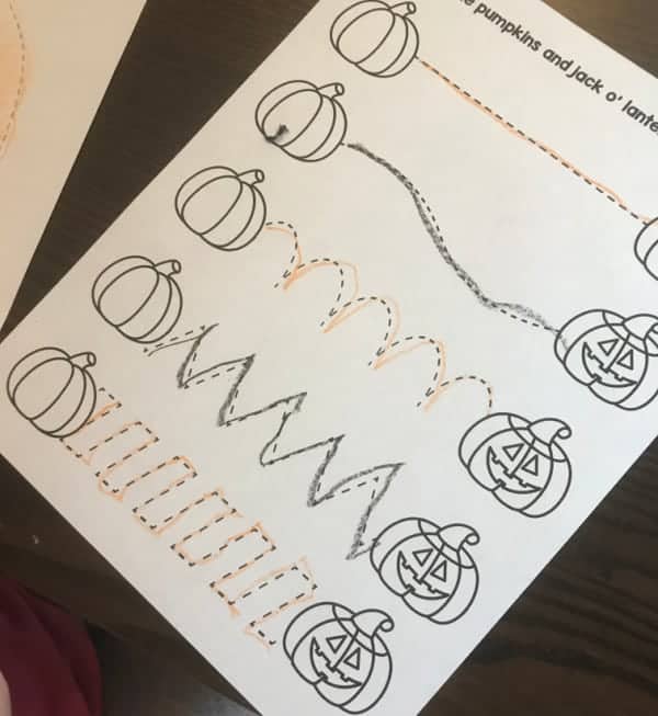 preschool pumpkin worksheet with tracing lines for pumpkins to jack-o-lanterns